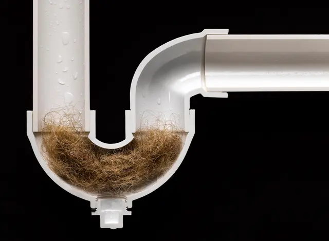 Siphon bouché - illustration d'une canalisation obstruée